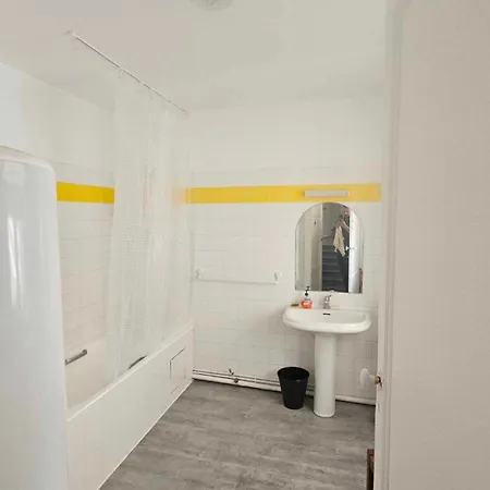 Quarto em Acomodações Particulares Le Jardin Cafe