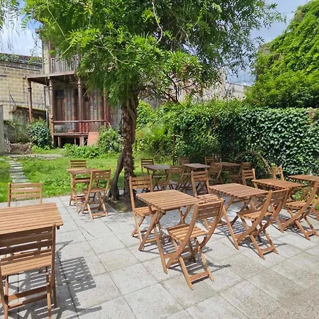Quarto em Acomodações Particulares Le Jardin Cafe