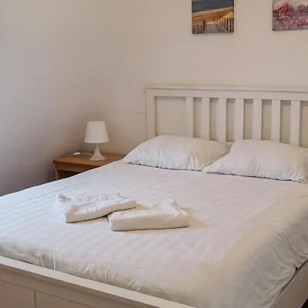 Quarto em Acomodações Particulares Le Jardin Cafe